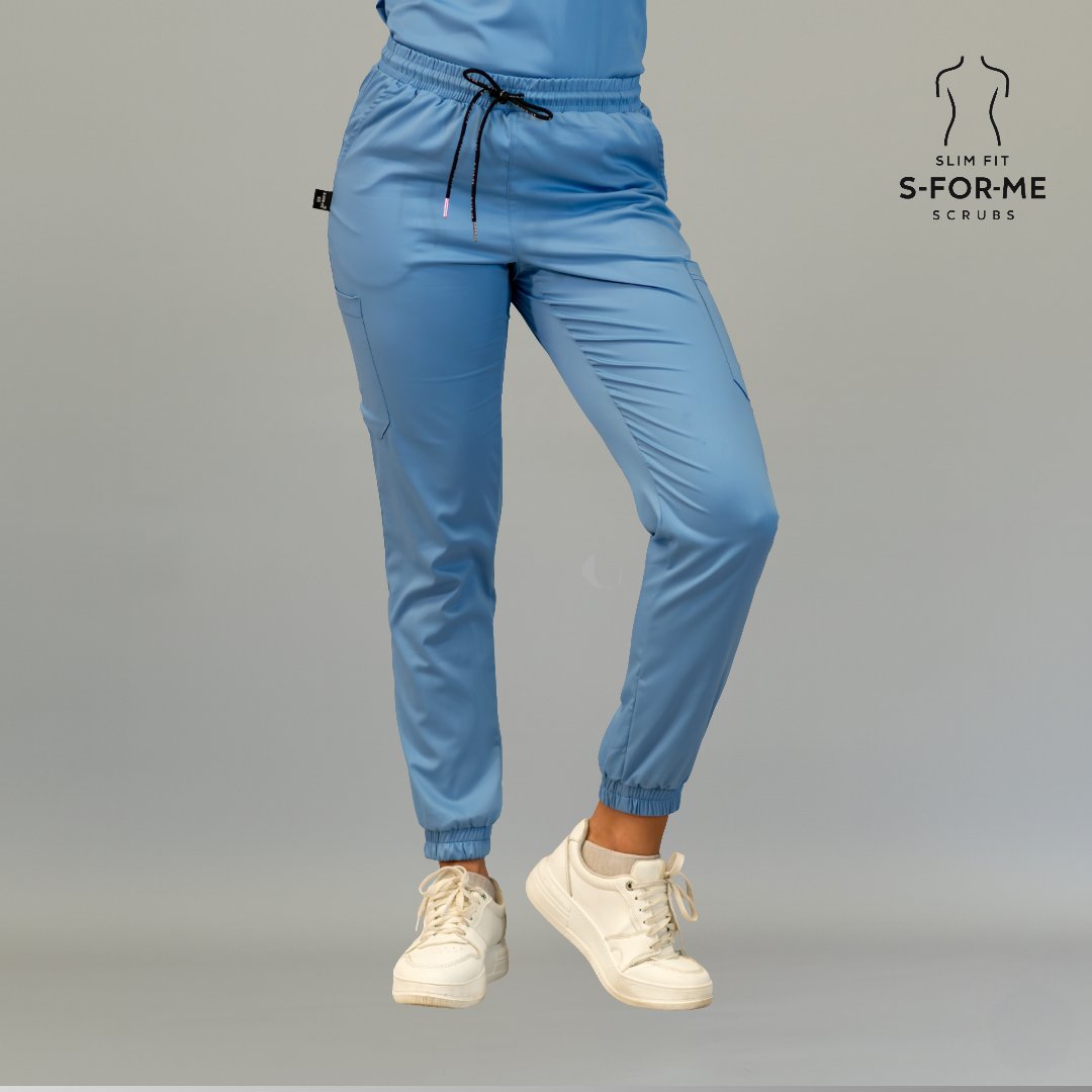 Close front view of women’s ceil blue Butter-Soft scrub joggers with slim fit
