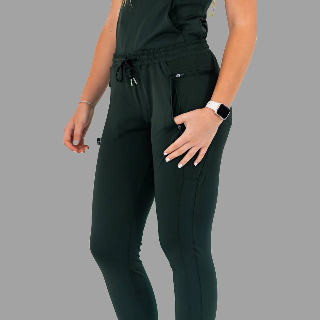 Close-up front view of women's scrub joggers 920 super stretch bottle green highlighting the drawstring.